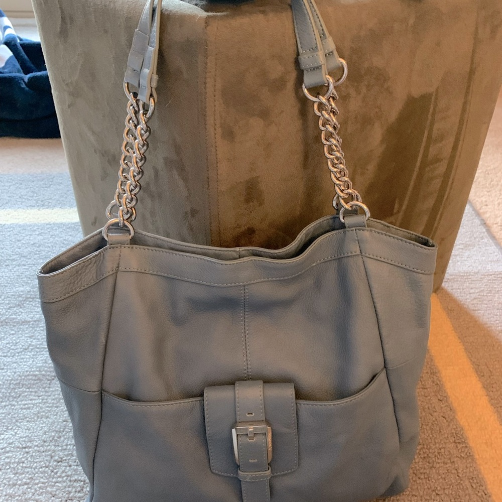 Pale blue Tognanello tote bag with chins and leather shoulder strap.
